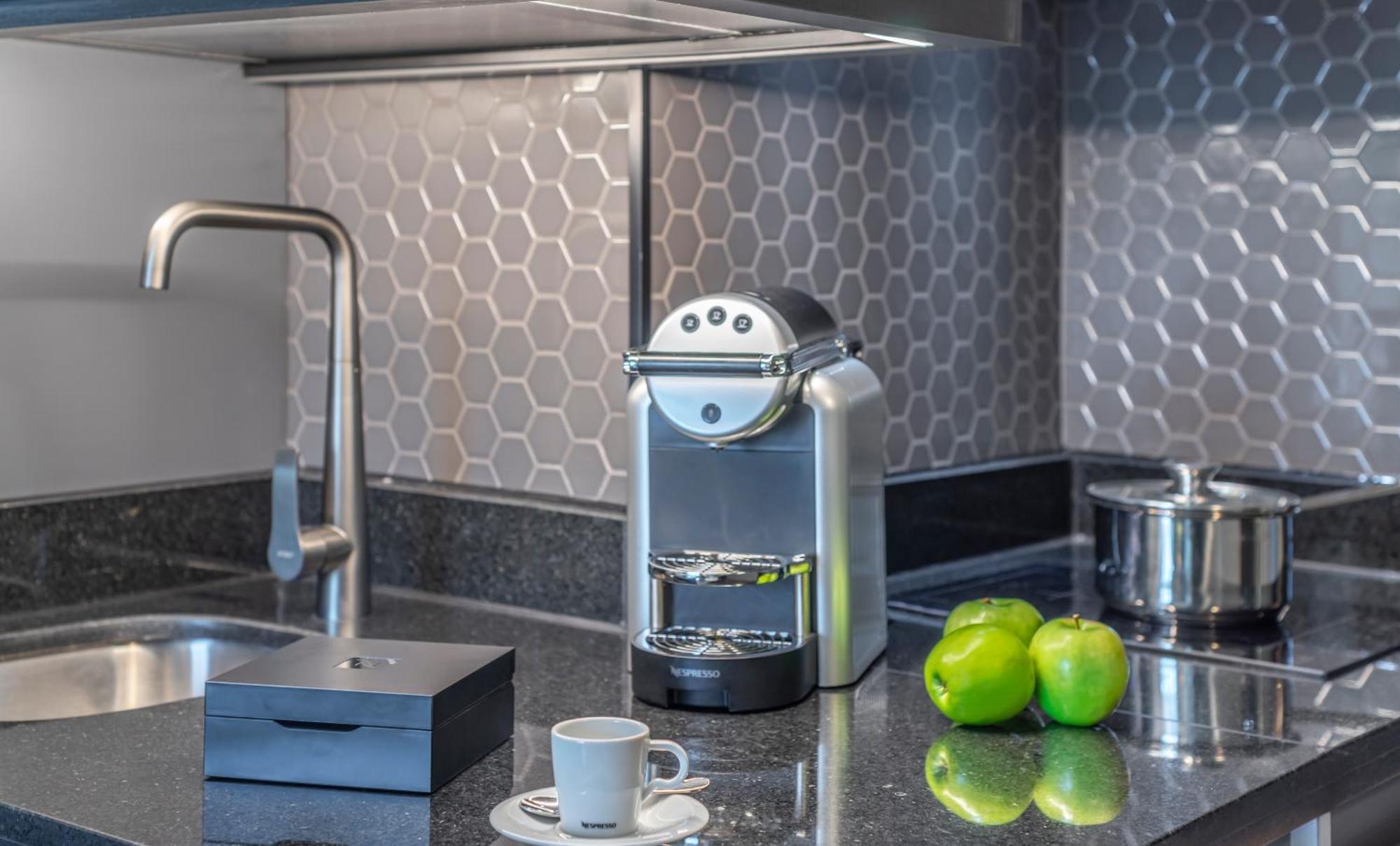 Pullman Santiago Vitacura Eksteriør billede A Nespresso coffee machine